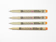 Orange Pigma Micron Pen